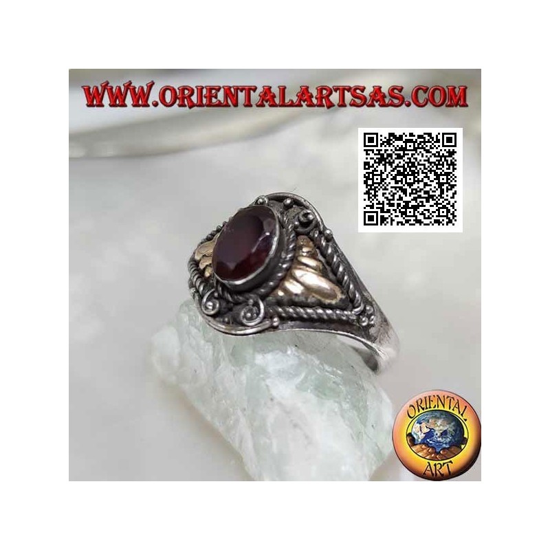 Silver ring with oval garnet and triangular cords with gold plate