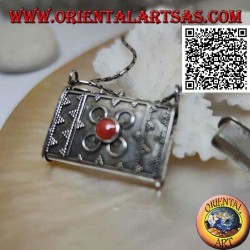 Silver box pendant in the shape of a handbag with embossed decorations and central Tibetan coral