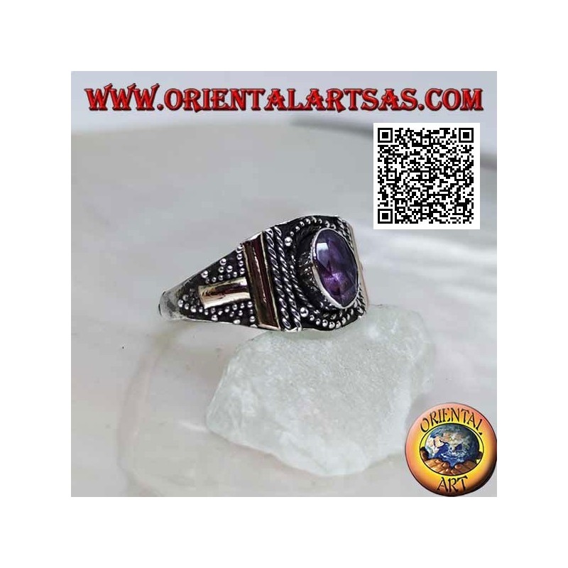 Silver ring with oval amethyst with decoration in balls and 14 karat gold plates