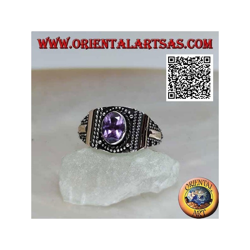 Silver ring with oval amethyst with decoration in balls and 14 karat gold plates