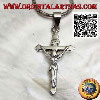 Silver pendant representing the crucifixion of Jesus Christ on a smooth cross