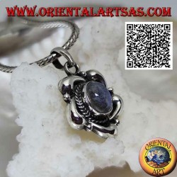 Silver pendant with oval blue labradorite in the center of a flower