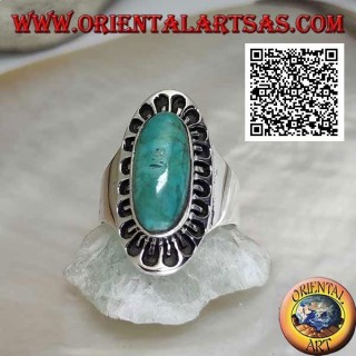 Silver ring with antique Tibetan turquoise elongated oval surrounded by engraved decoration