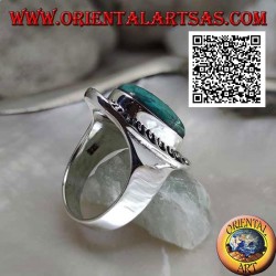 Silver ring with antique Tibetan turquoise elongated oval surrounded by engraved decoration