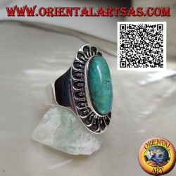 Silver ring with antique Tibetan turquoise elongated oval surrounded by engraved decoration