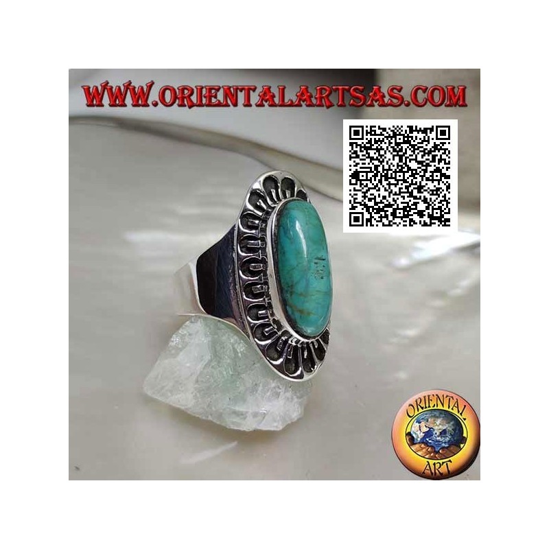 Anillo de plata con óvalo alargado de turquesa tibetana antigua rodeado de decoración grabada