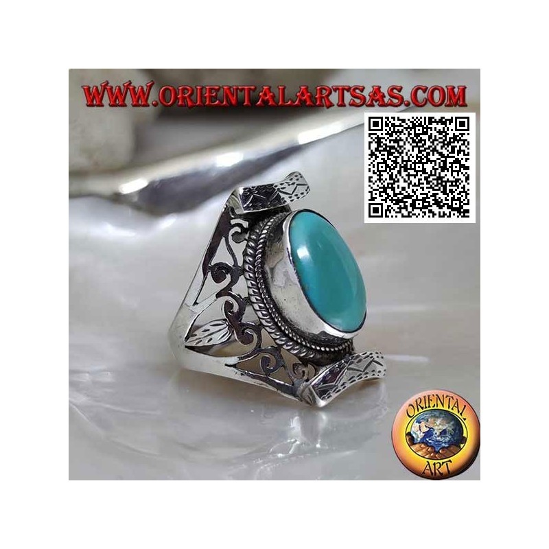 Silver ring with antique oval Tibetan turquoise in Nepalese setting with openwork on the sides