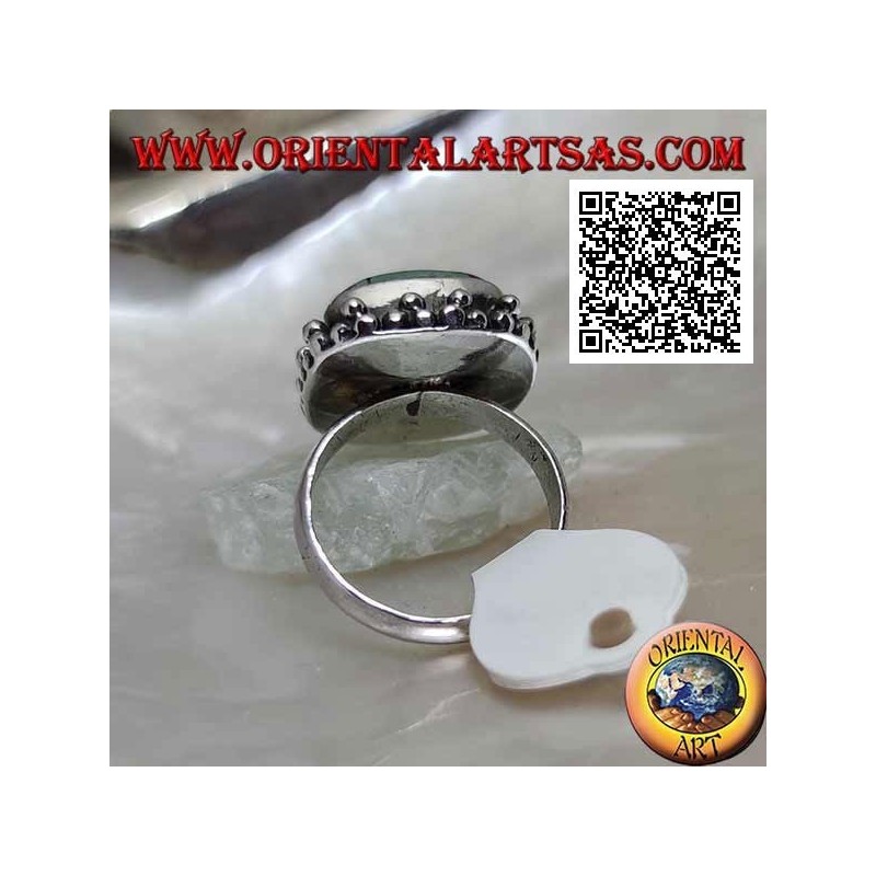 Anello in argento con turchese tibetano antico quadrato smussato contornato da palline