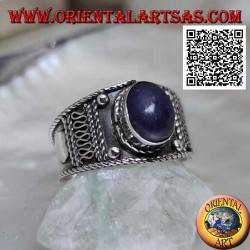 Silver band ring with oval cabochon lapis lazuli and ethnic decorations