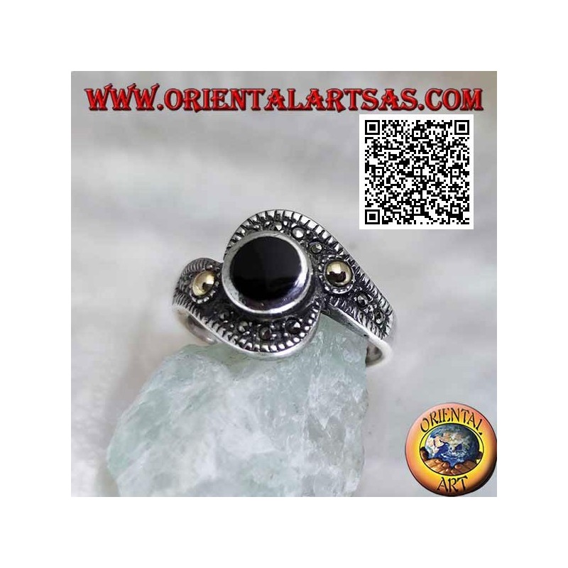Silver ring with round onyx wrapped in a marcasite band with a gold-plated ball on the sides