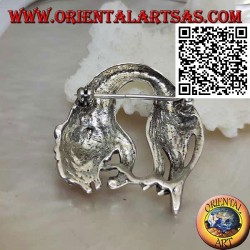 Silver brooch, lion (king of the forest) folded while feeding