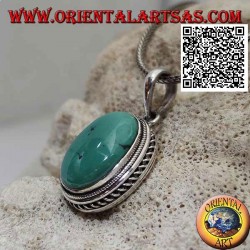 Pendentif en argent avec cabochon turquoise antique ovale entouré d'un tissage hélicoïdal