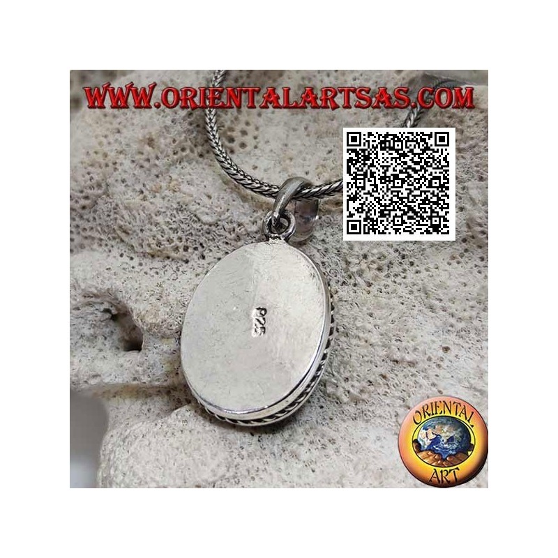 Colgante de plata con óvalo de cabujón turquesa antiguo rodeado de tejido helicoidal