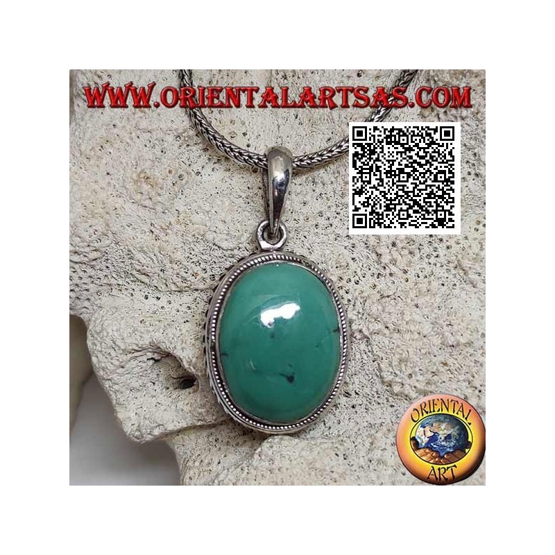 Silver pendant with antique turquoise cabochon oval surrounded by helical weave