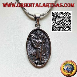 Silver pendant, sacred oval medal with St. Christopher with stick and child in bas-relief