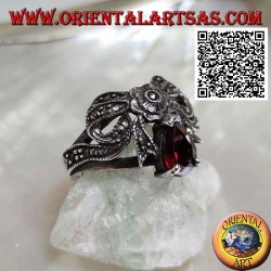 Silver ring in the shape of a bow studded with marcasite with central flower and drop-shaped garnet set