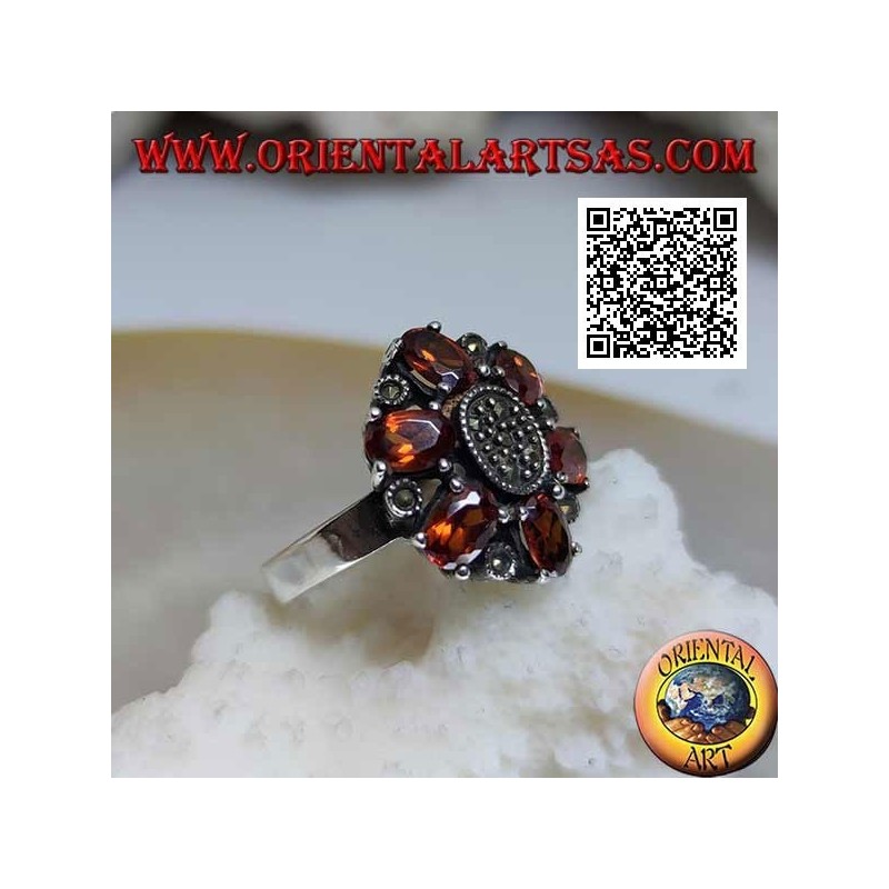 Silver flower ring with 6 oval mandarin garnets (Spessartina) and central marcasite