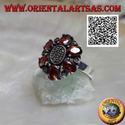 Silver flower ring with 6 oval mandarin garnets (Spessartina) and central marcasite