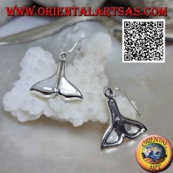 Silver earrings in the shape of a whale tail with mother of pearl