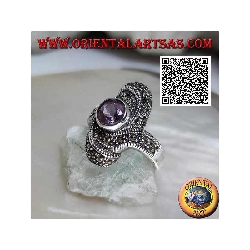 Silver ring with natural round amethyst in the center of an oval vortex studded with marcasite