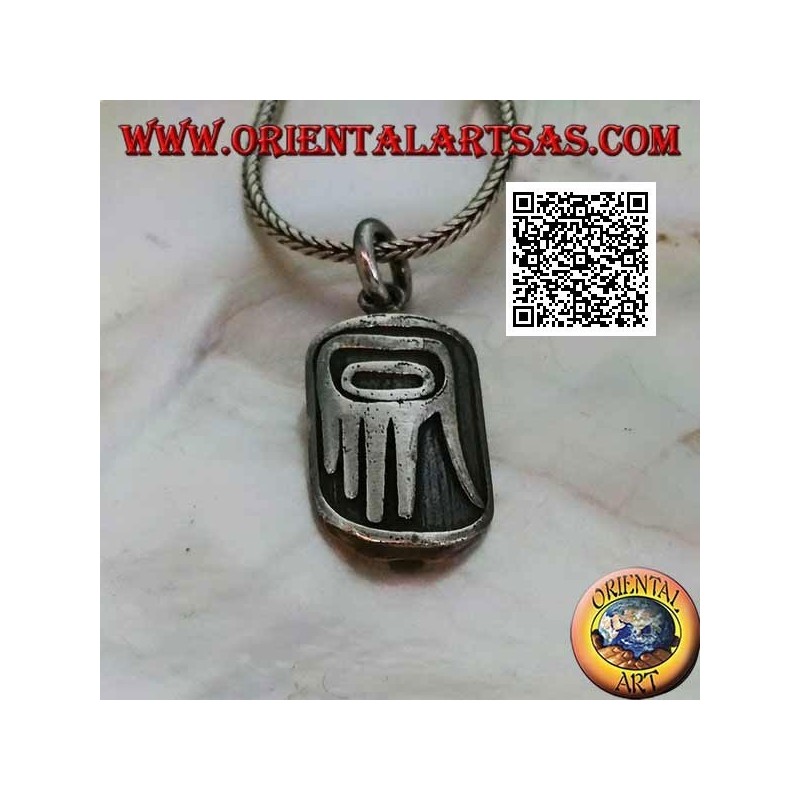 Silver pendant medal with aboriginal hand of primitives in bas-relief