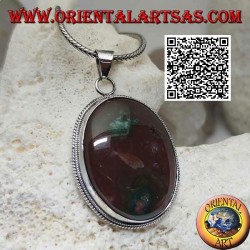 Silver pendant with large oval brecciated red jasper surrounded by weaving