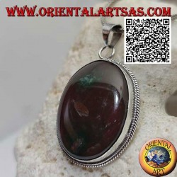 Silver pendant with large oval brecciated red jasper surrounded by weaving