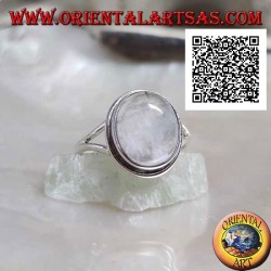 Silver ring with cabochon oval moonstone on simple setting and triangular fretwork on the sides