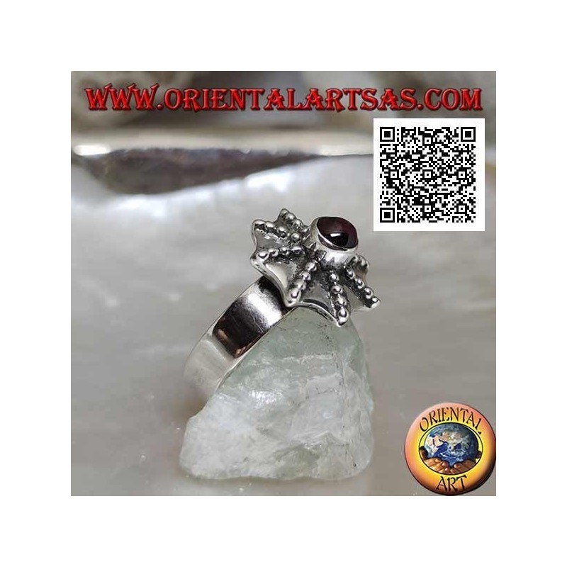 Anello in argento a forma di ombrello pagoda con granato tondo centrale