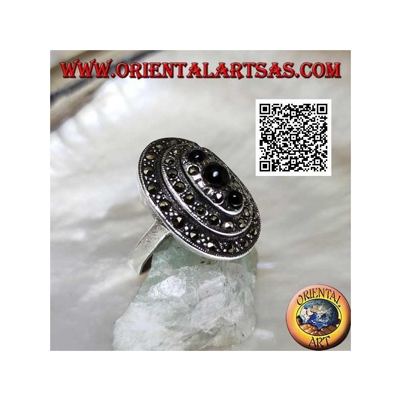 Oval silver ring with three levels of marcasite with a trio of round onyx on top
