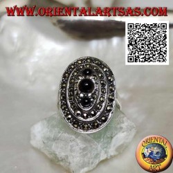 Oval silver ring with three levels of marcasite with a trio of round onyx on top