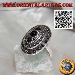 Oval silver ring with three levels of marcasite with a trio of round onyx on top