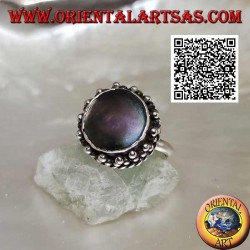 Silver ring with round abalone paua shell surrounded by interweaving and trio of balls