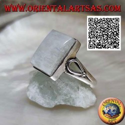 Silver ring with rectangular rainbow moonstone on smooth setting with teardrop opening on the sides