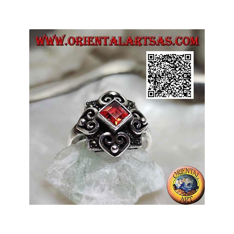 Silver ring with natural rhomboid garnet on a marcasite setting and four hearts