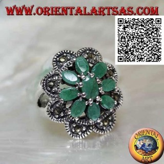 Flower ring in silver with 8 petals of natural emeralds set oval with rounded frame of marcasite