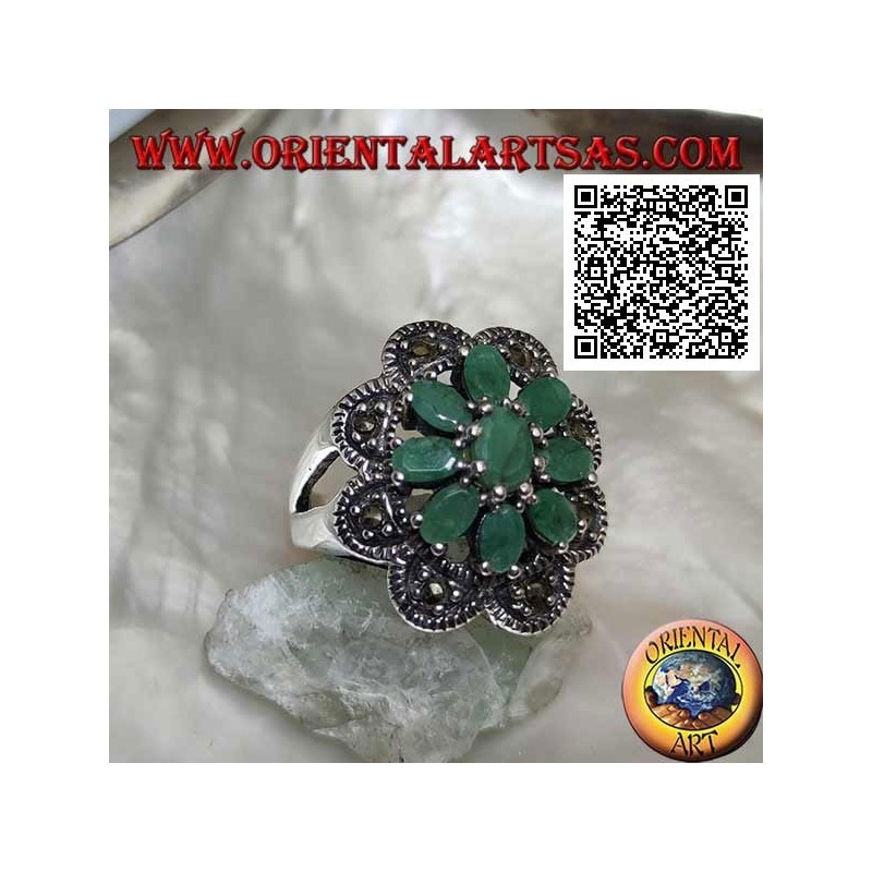 Flower ring in silver with 8 petals of natural emeralds set oval with rounded frame of marcasite