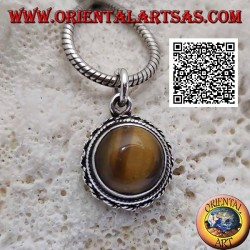 Silver pendant with round tiger eye with vertical streaks surrounded by weaving