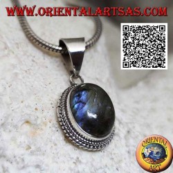 Silver pendant with cabochon oval labradorite surrounded by weaving