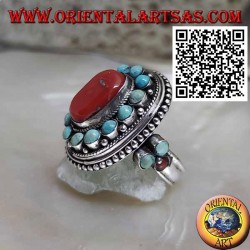 Nepalese style silver ring with natural oval coral and turquoise spheres in the frame and on the sides