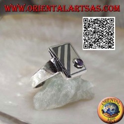 Square silver ring with oblique niello lines and round amethyst in one corner