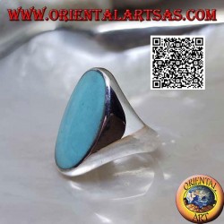 Silver ring with oval turquoise set flush with the edge on a smooth frame