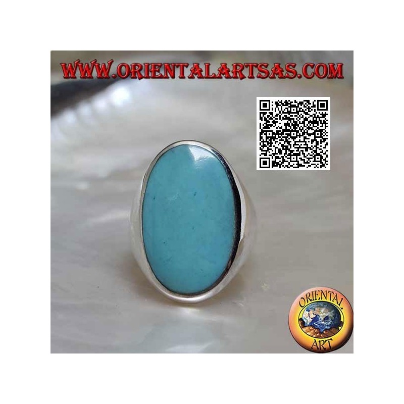 Anillo de plata con turquesa ovalada engastada al ras con el borde sobre un marco liso