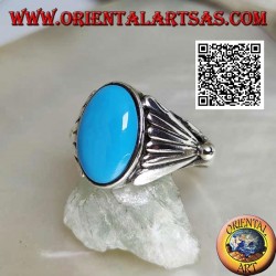 Anillo de plata con cabujón ovalado turquesa con abanico liso en los laterales