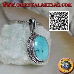 Silver pendant with natural oval turquoise surrounded by interweaving and helical line