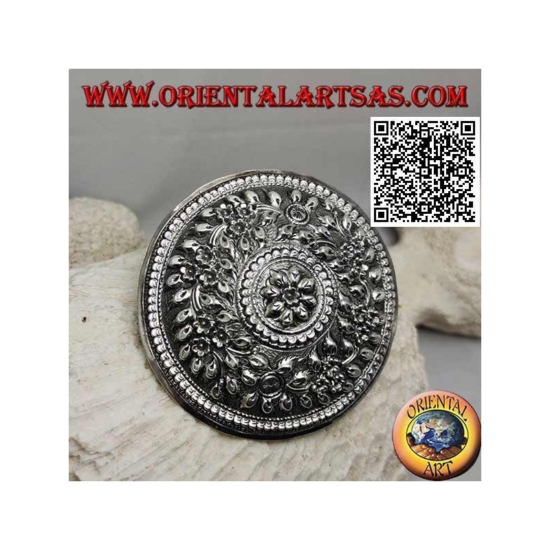 Silver chiseled shield with floral decoration with central flower (metal clip closure)
