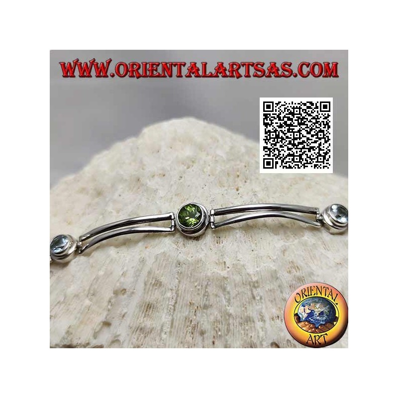 Smooth semi-rigid silver bracelet with peridot between two round aquamarines