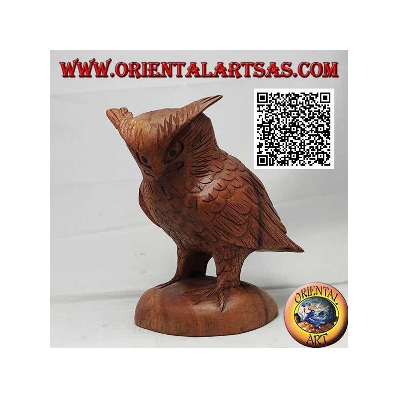 Sculpture of an eagle owl standing upright on its paws hand-carved in suar wood of 17 cm