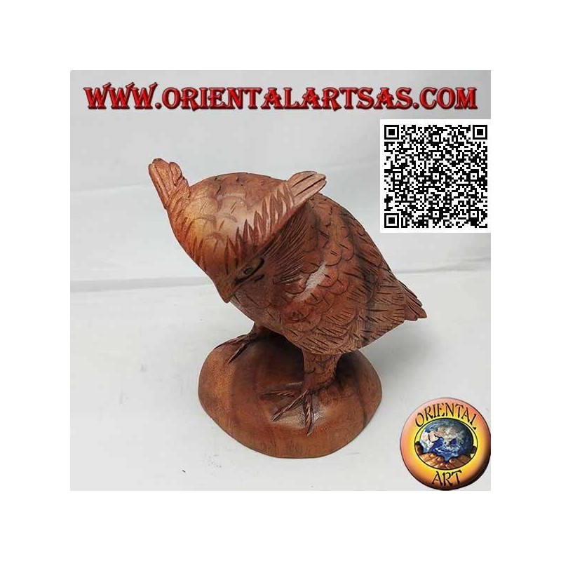 Sculpture of an eagle owl standing upright on its paws hand-carved in suar wood of 17 cm