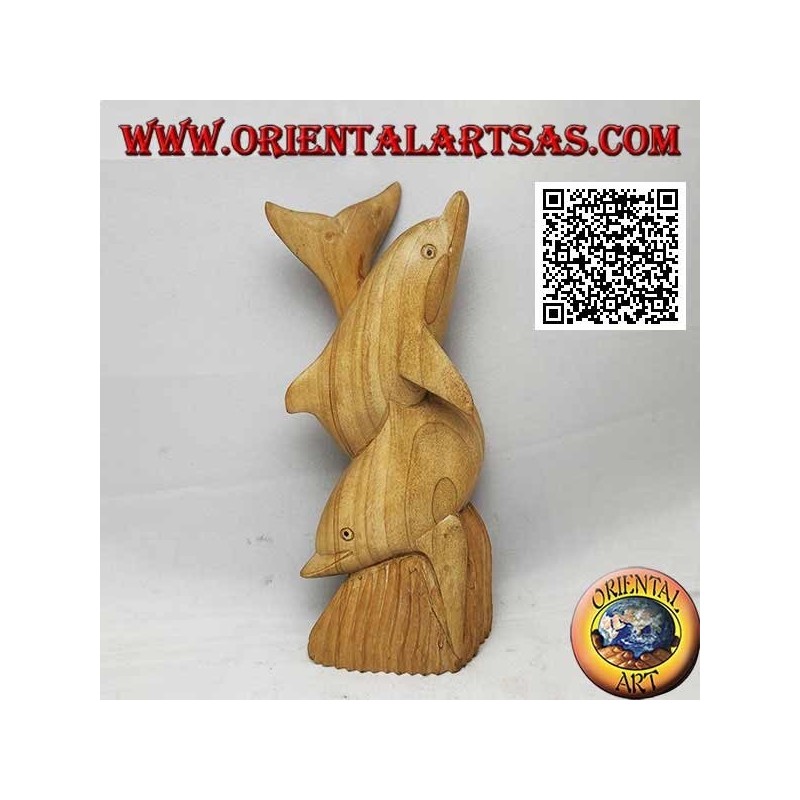 Sculpture d'un couple de dauphins tordus sur un récif en bois d'hibiscus de 19 cm